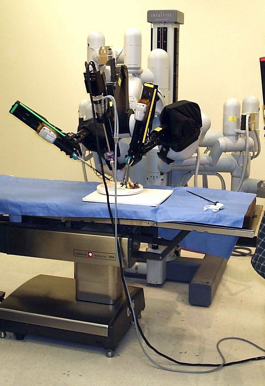 A da Vinci robotic surgical system console and patient-side cart, the platform used for robotic-assisted minimally invasive surgery